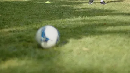Horizontal video: A boy catching a football 8813016. Duration: 10 seconds. Resolution: 2688x1512