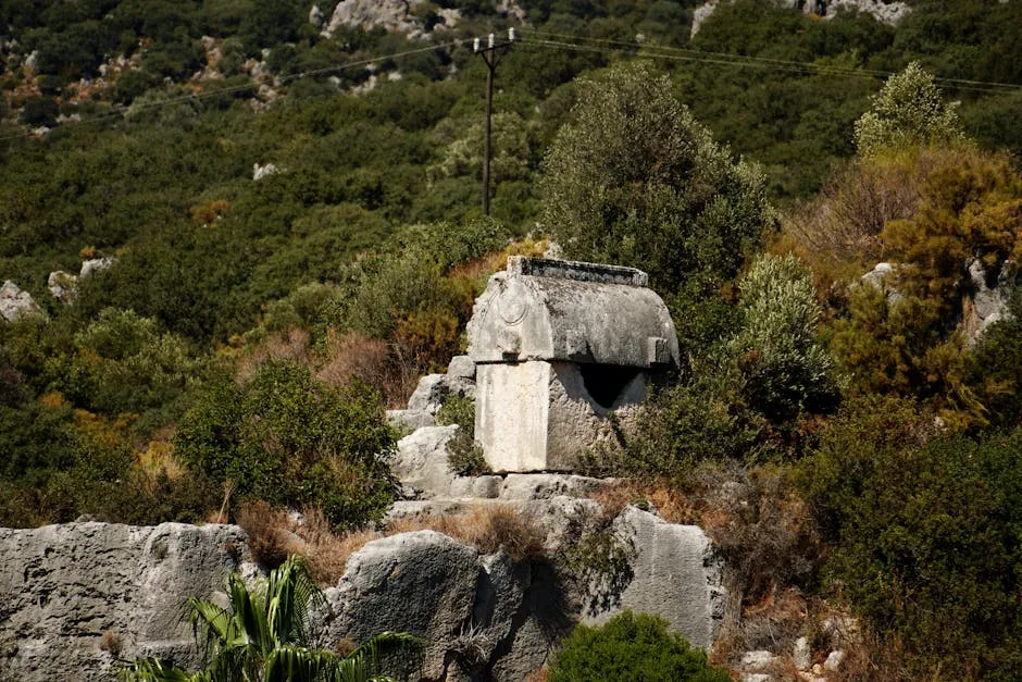 Ancient Stone Tomb Amidst Verdant Hillside