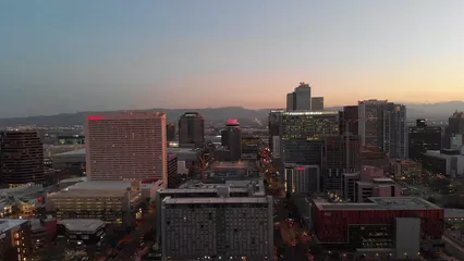 Horizontal video: Drone view of a cityscape at dusk 3764605. Duration: 90 seconds. Resolution: 3840x2160