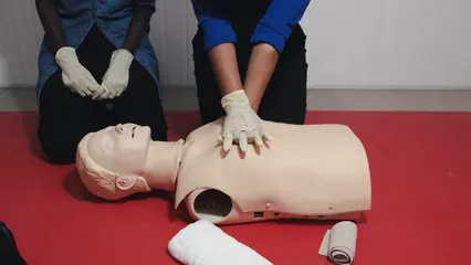 Horizontal video: Cardio pulmonary resuscitation technique demonstration in a seminar 3981776. Duration: 10 seconds. Resolution: 3840x2160
