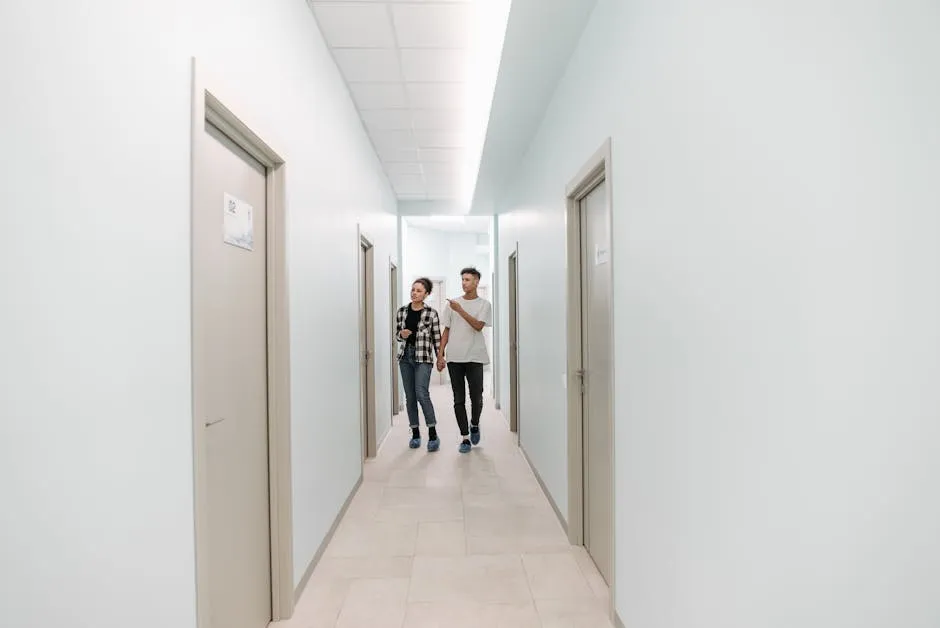 Couple Searching Examination Room in Hospital