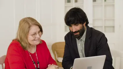 Horizontal video: Two people using laptop 8439257. Duration: 13 seconds. Resolution: 3840x2160