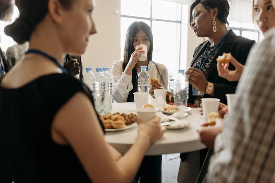 A Group of People Talking in the Office