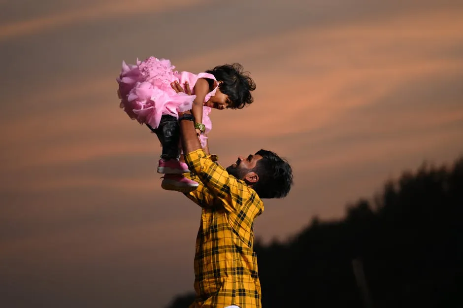 Smiling Father Raising Daughter