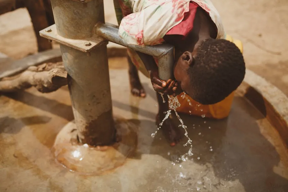 Girl Drinking Water from the Pipe 