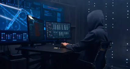 Horizontal video: A person wearing hoody typing on the keyboard 4389357. Duration: 28 seconds. Resolution: 3840x2024