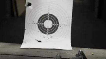 Horizontal video: A happy woman holding earmuffs at a shooting range 5243191. Duration: 5 seconds. Resolution: 1920x1080