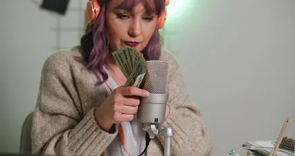 Horizontal video: Woman holding money 6953255. Duration: 10 seconds. Resolution: 4096x2160