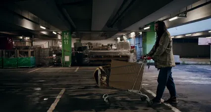 Horizontal video: A homeless man pushing a shopping cart 8077304. Duration: 27 seconds. Resolution: 4096x2160