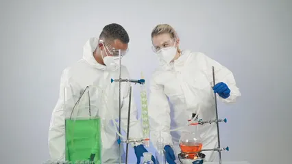 Horizontal video: A man and woman experimenting in the laboratory 9244457. Duration: 26 seconds. Resolution: 1920x1080