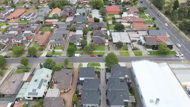 Horizontal video: An aerial view of a suburban neighborhood 26741415. Duration: 33 seconds. Resolution: 3840x2160
