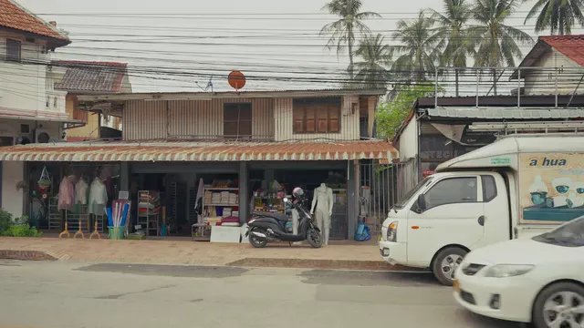 Horizontal video: Bustling streets of luang prabang laos 28824526. Duration: 3 seconds. Resolution: 3840x2160