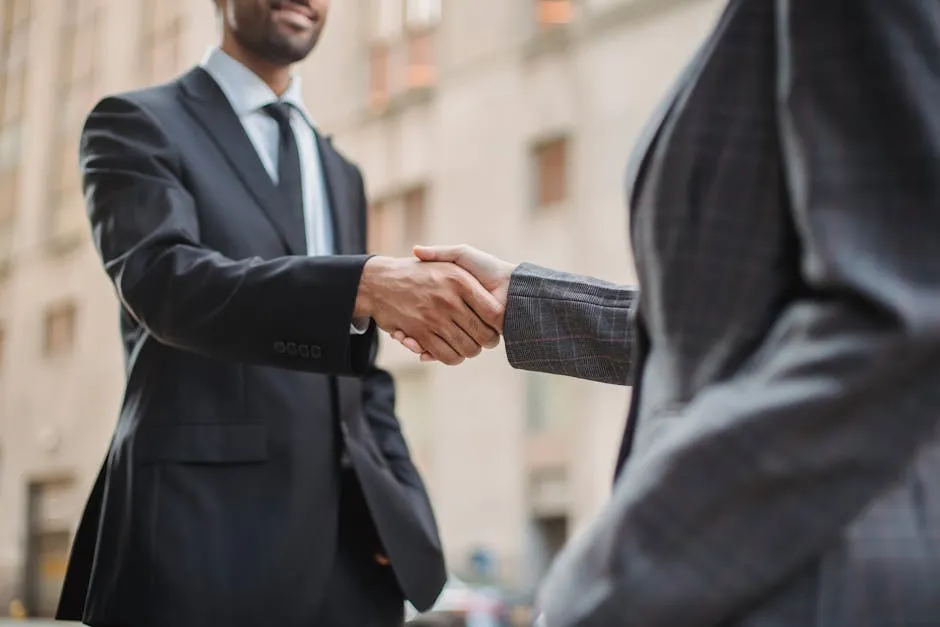 Two People Shaking Hands