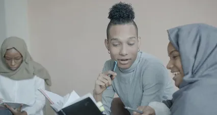 Horizontal video: People holding notebook while talking 6245834. Duration: 11 seconds. Resolution: 4096x2160