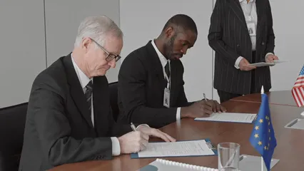 Horizontal video: Politicians signing agreement and shaking hands 6951979. Duration: 28 seconds. Resolution: 3840x2160