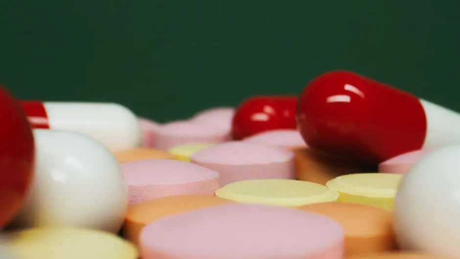 A Group of Capsules and Tablets in Close-up Shot
