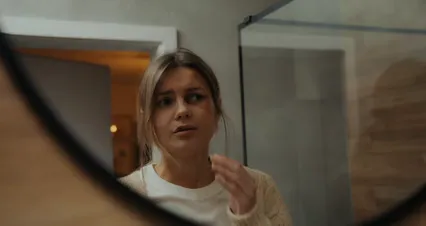 Horizontal video: A woman looking in the mirror and feeling sad 7698694. Duration: 22 seconds. Resolution: 4096x2160