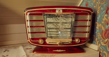 Horizontal video: A hand turning a knob on an old radio set 8090544. Duration: 25 seconds. Resolution: 4096x2160