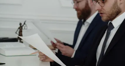 Horizontal video: Lawyers reading a contract 8135942. Duration: 14 seconds. Resolution: 4096x2160