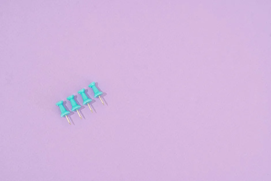 Pins on a Purple Surface