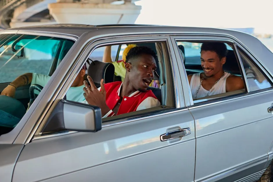 Young Men Sitting in a Sedan