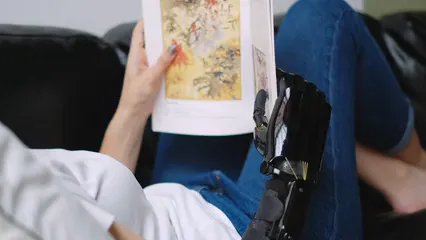 Horizontal video: Person reading a magazine 5756277. Duration: 26 seconds. Resolution: 3840x2160