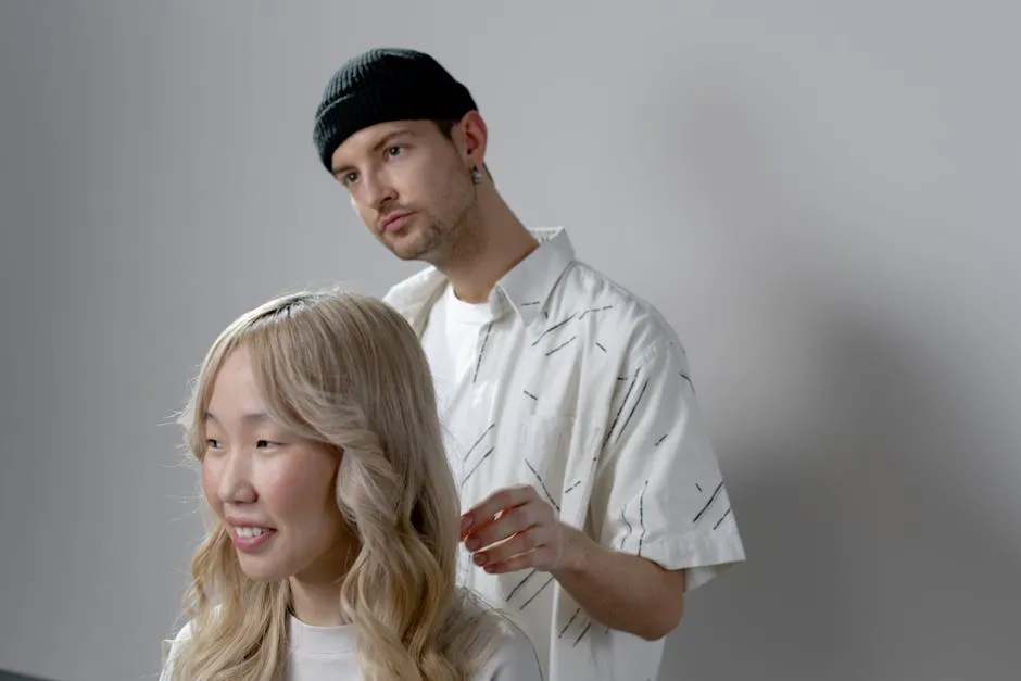 Man With Black Beanie Hat Holding Woman's Hair