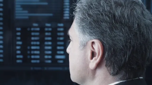 Horizontal video: Man looking at a screen 8348730. Duration: 10 seconds. Resolution: 3840x2160