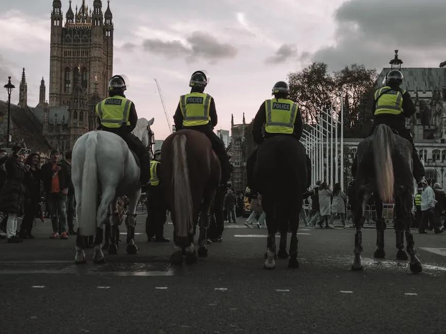 Police Officers on Horseback Guarding the Streets of London in Front of The Houses of Parliament