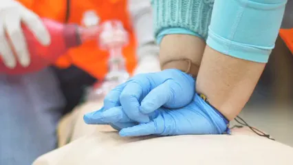 Horizontal video: Close up of people practicing cpr 6531400. Duration: 10 seconds. Resolution: 3840x2160