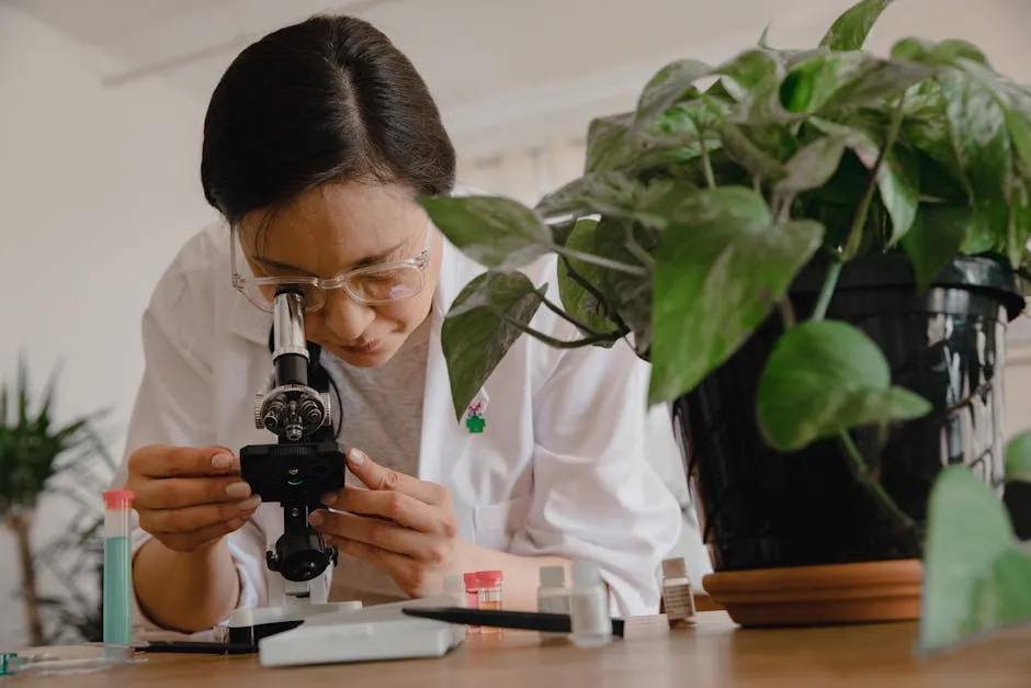 Woman Looking Through a Microscope