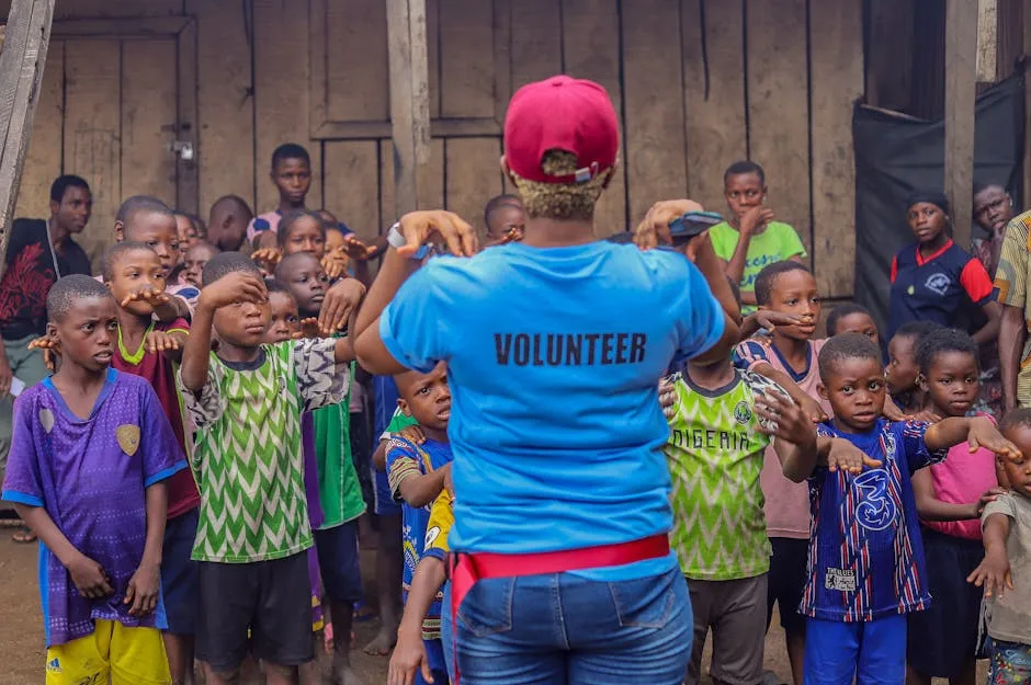 A Volunteer Giving Charity to Children