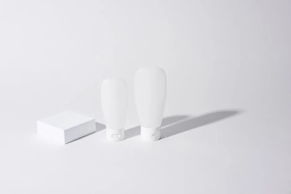 White Containers on White Surface