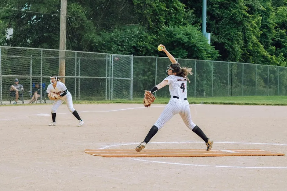 A dynamic shot of a female softball pitcher during a game in Columbia, MD.