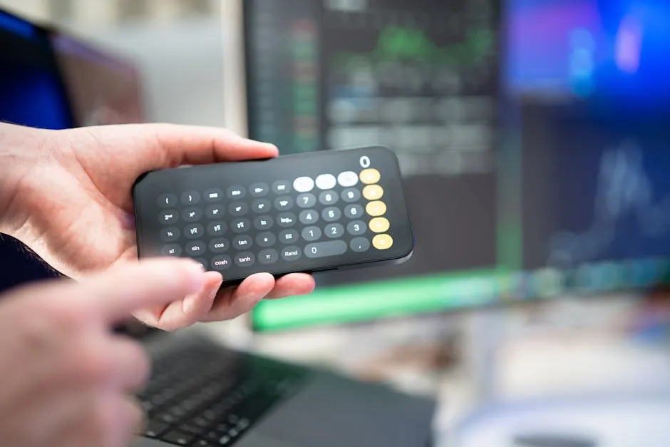 Person Hands Holding Calculator in Smartphone