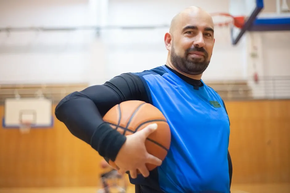 A Man Holding a Basketball