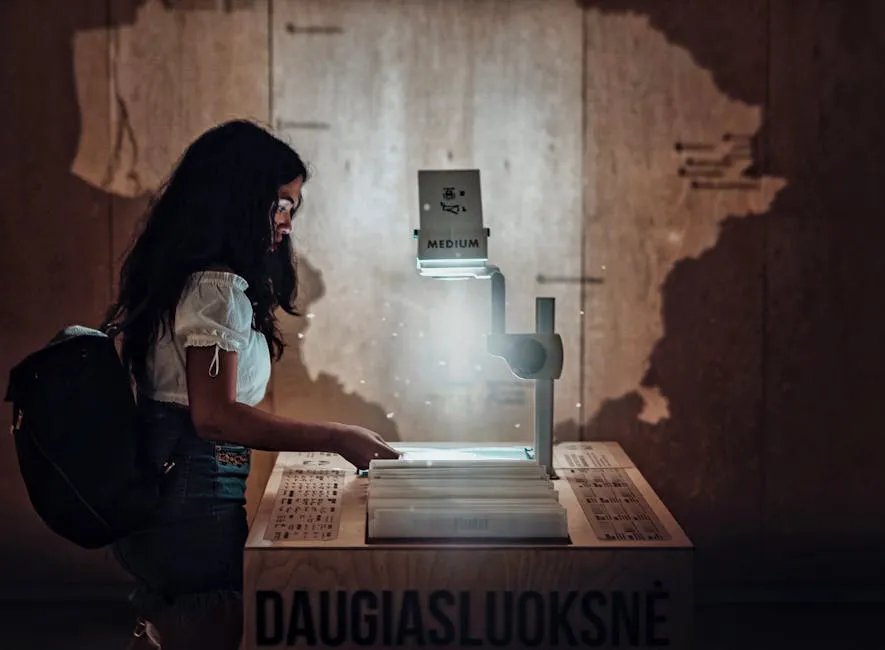 A young woman interacts with an overhead projector in a dimly lit educational setting.